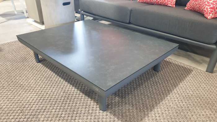 Club outdoor coffee table by Couture. Powder-coated aluminium with ceramic top. Faux anthracite marble top.