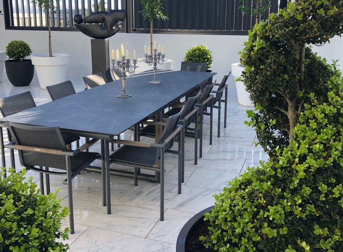 BASTINGAGE outdoor extension table by Les Jardins 210-315cm. Shown with matching BASTINGAGE dining chairs. 
Photo courtesy of our very satisfied Auckland customer.