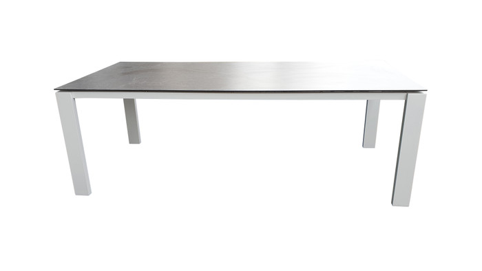 Side view of Poly Ceramic top and aluminium frame outdoor dining table in 2 colour ways. Size 220x100
Table shown is white frame with dark grey ceramic top.