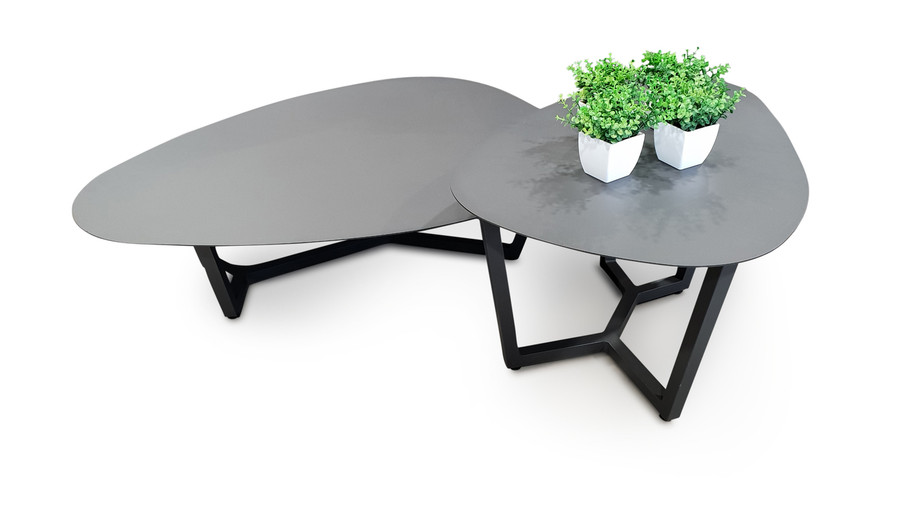 The LEAF outdoor coffee table is the smaller and taller of 2 available Leaf coffee tables. In this picture, you can see the coffee table nested up against the larger and lower Leaf coffee table.
Available in two sizes: 90x60x45H OR 120x90x30 - Lava or White