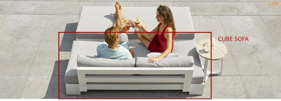 Cube outdoor sofa, as depicted by in the red area. Also shows optional Cube bench, NOT AVAILABLE IN WHITE AS SHOWN, ONLY WITH CHARCOAL FRAME