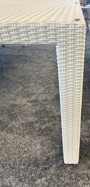 Pic showing the leg of DARWIN table in snow white Ecolene outdoor rattan.