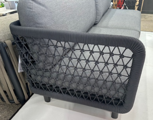 CLUB Right Arm sofa, close up picture of the outdoor rope woven over powdercoated aluminium frames, and Couturetex dark grey  cushion colour, dark grey rope