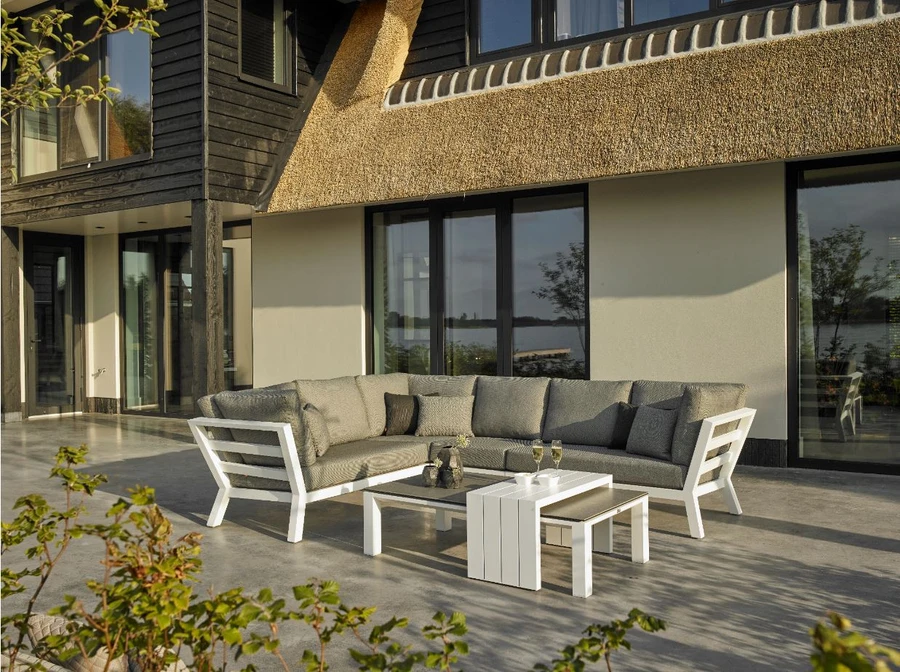 TIMBER Outdoor corner lounge set with high arm in white powder-coated aluminium frame. 
Includes : left and right arms, single and corner sofa. 4 pieces.

Cushions in picture are similar in look to actual cushions supplied by Poynters. But our cushions have been upgraded to premium Sunbrella Fabric in Natte grey.
Scatter cushions and coffee table are NOT included. The coffee table pictured - CONCEPT -  is available separately.