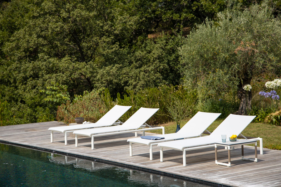 This image for illustrative purposes only. White frame version of Bastingage sun lounger shown.
Bastingage batyline mesh and aluminium frame sun lounger by les Jardins with teak accent