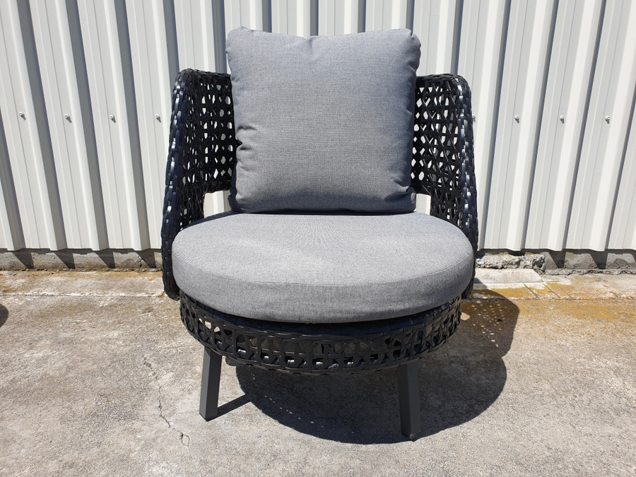 Front view of Tiki outdoor swivel chair. Powdercoated aluminium frame and black synthetic wicker