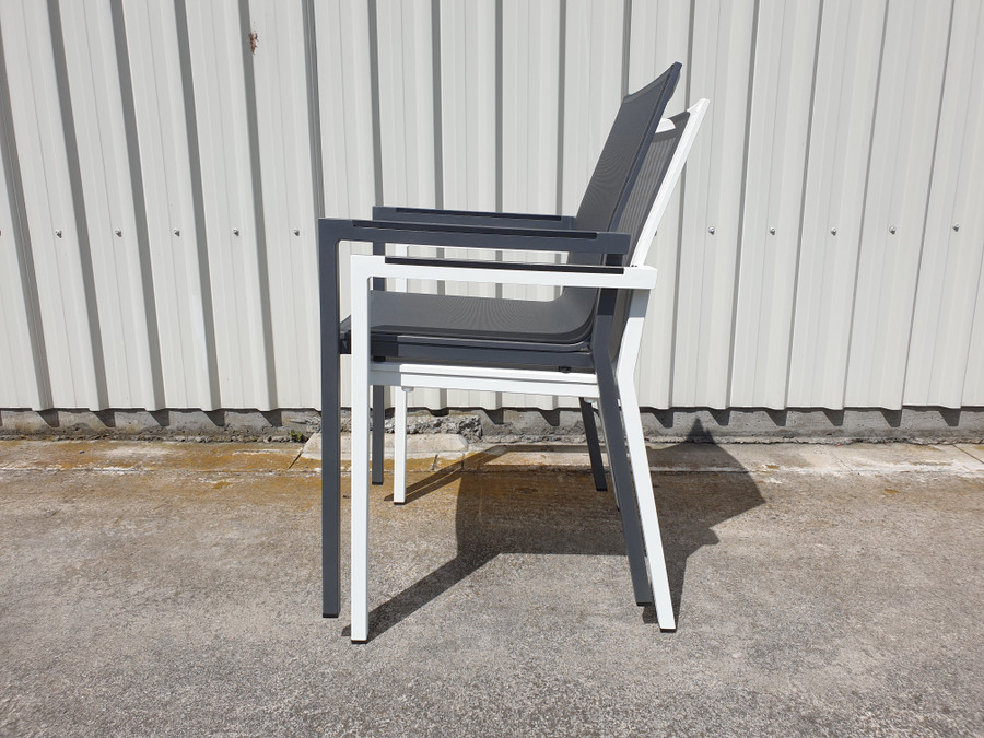 AMAKA dining arm chair is stackable - available in Space Grey or White