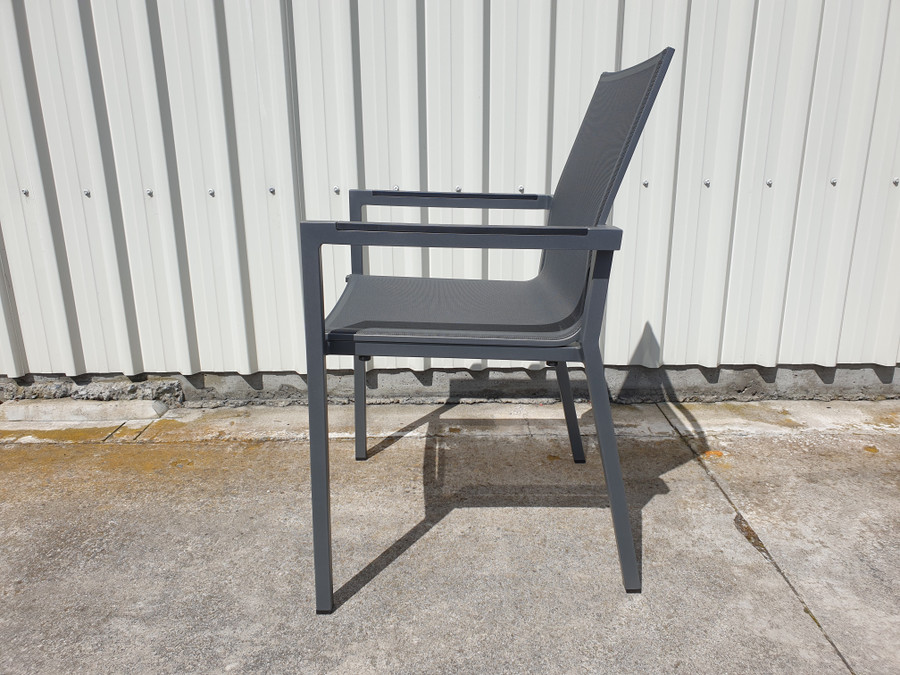 Side view of AMAKA dining arm chair in slate grey