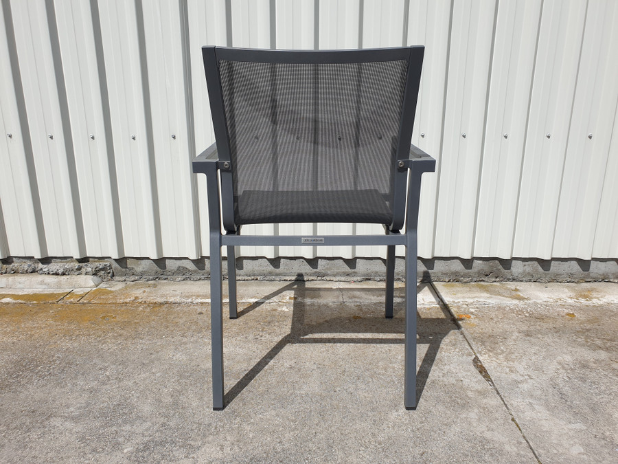 Rear view of AMAKA dining arm chair in slate grey