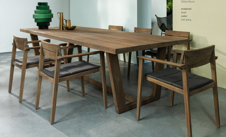 JIM Outdoor table shown in situ with our DEAN outdoor teak chairs. Please note the colour in the picture is different (slightly darker)  from the original  (honey colour) finish that we supply.  When exposed to outdoor elements, the teak wood will turn to silver grey colour over time.