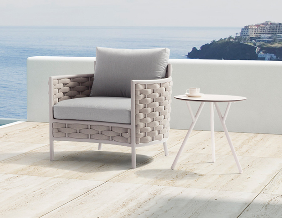 Loop outdoor aluminium and strap low arm chair by Couture Jardin