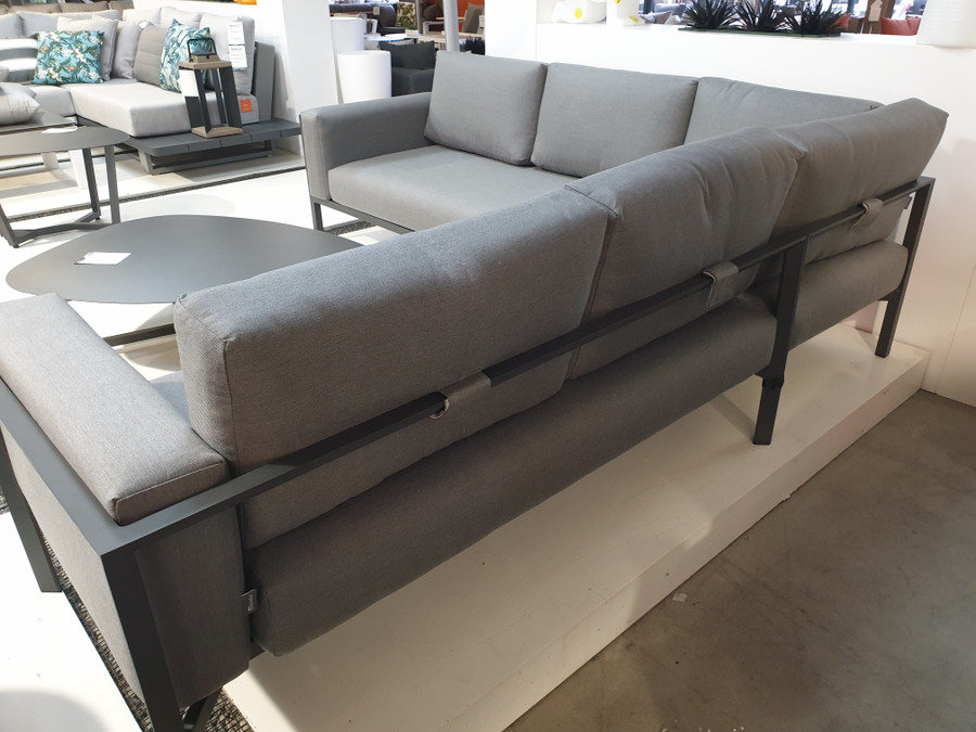 Rear view of Reef outdoor corner sofa set in Charcoal with Natte Grey Sunbrella cushions. Picture also shows Leaf coffee table and optional extra single sofa piece which are available separately.
NOW ONLY AVAILABLE WITH WHITE FRAME AND NATTE GREY CUSHIONS AS ILLUSTRATED! CHARCOAL FRAME SOLD OUT!