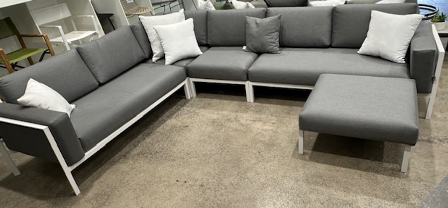 Reef modular sofa setting, shown with optional ottoman, white scatter cushions shown are available separately.