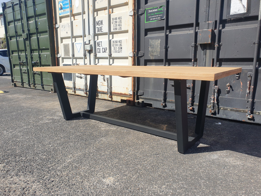 Another view of Joe teak and aluminiun outdoor table with tapered legs