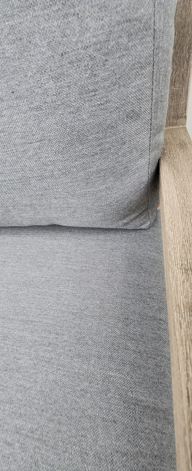 Close up  view of the PLAZA BURMA Low Lounging Arm Chair with SUNBRELLA cushions - the most trusted performance fabric in the world. Cushion inners are made from quick dry foam