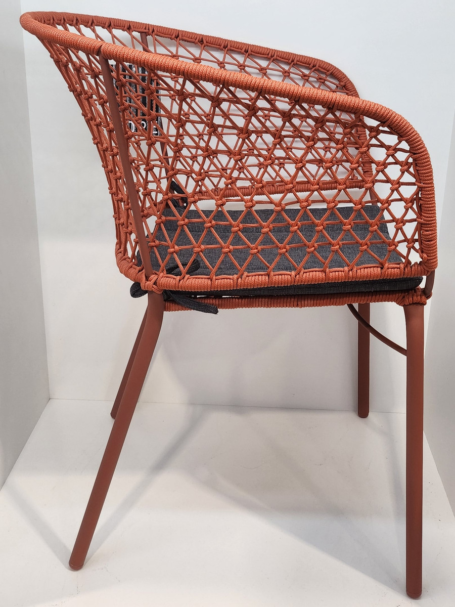 CRYSTAL stackable dining armchairs available in various colours - coral, camel and moss 
Includes outdoor seat cushion
Displayed here in Coral on a galvanised steel frame - side view