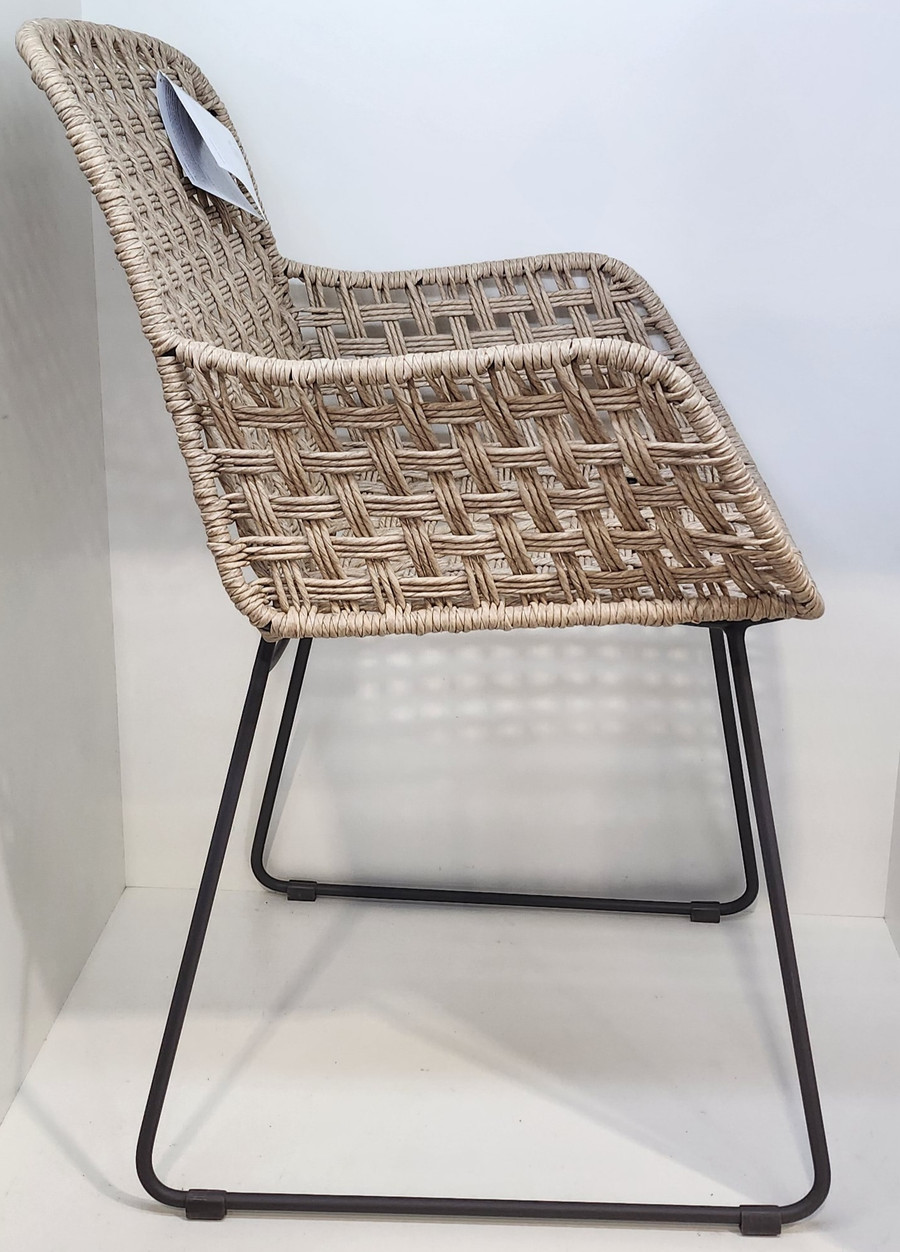 KAIA Dining Armchair - white shell ecolene wicker on a coal hot dipped galvanised steel frame with sleigh legs - side view 
Also available in the matching KAIA dining side chair