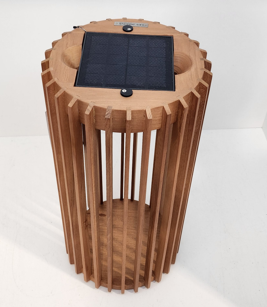 Birds eye view of the TECK solar lantern with teak slats. Solar panel attached at the top of the lantern - 21cm diameter x 45cm high