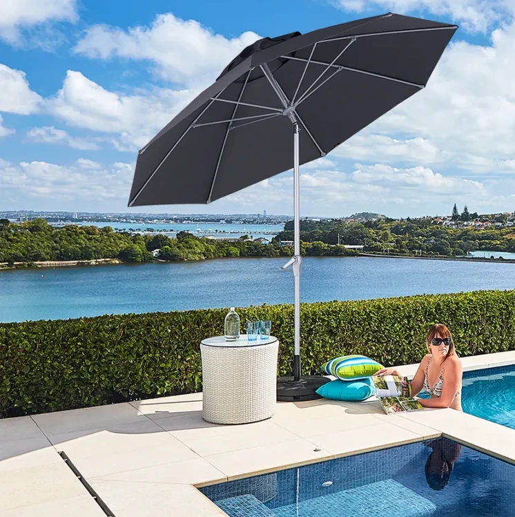 Venice 2.2m tilt umbrella in charcoal fabric. Aluminium mast, high strength fiberglass arms.