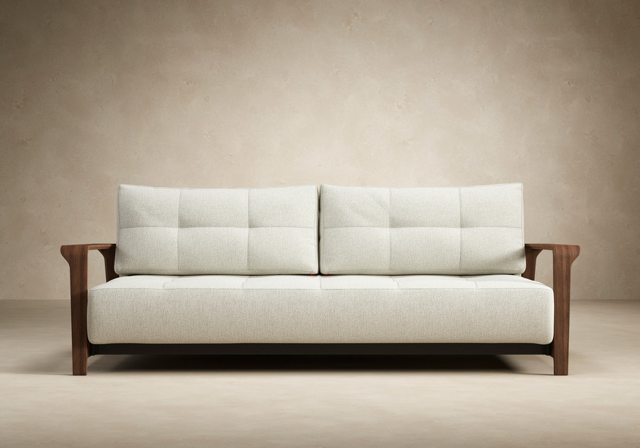 Displayed here as a sofa, the RAN Queen size sofa bed with dark walnut arms . Various fabric options are available.
Please ask our friendly staff for assistance when choosing fabric options.