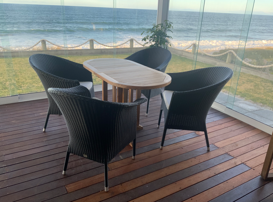 San Remo black chairs and folding Balcony table in situ, enjoyed seaside by  happy Poynters' customers