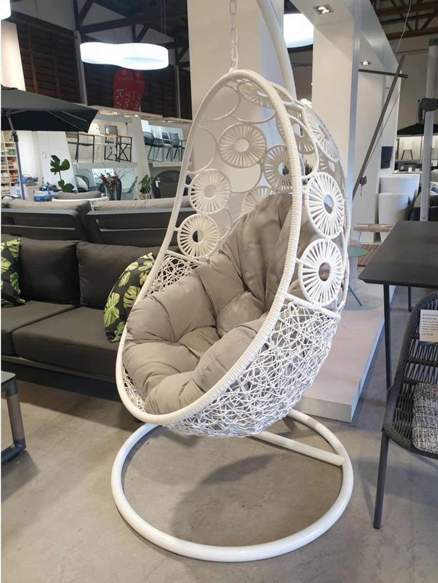 Bloom outdoor hanging chair. Fished with white frame and white wicker.