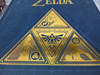 cover image of The Legend of Zelda Encyclopedia Hardcover gold leave has some scuffs