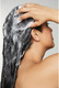 Model with Paul Mitchell Awapuhi Moisturizing Lather Shampoo 33.8 oz
