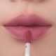 Model with ROMAND Zero Velvet Tint 18 Petal Tassel