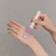 A curved, soft brush designed for smooth and hygienic application of creams and masks.