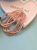 Peachy-pink Six-strand Pearl Bracelet
