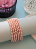 Peachy-pink Six-strand Pearl Bracelet