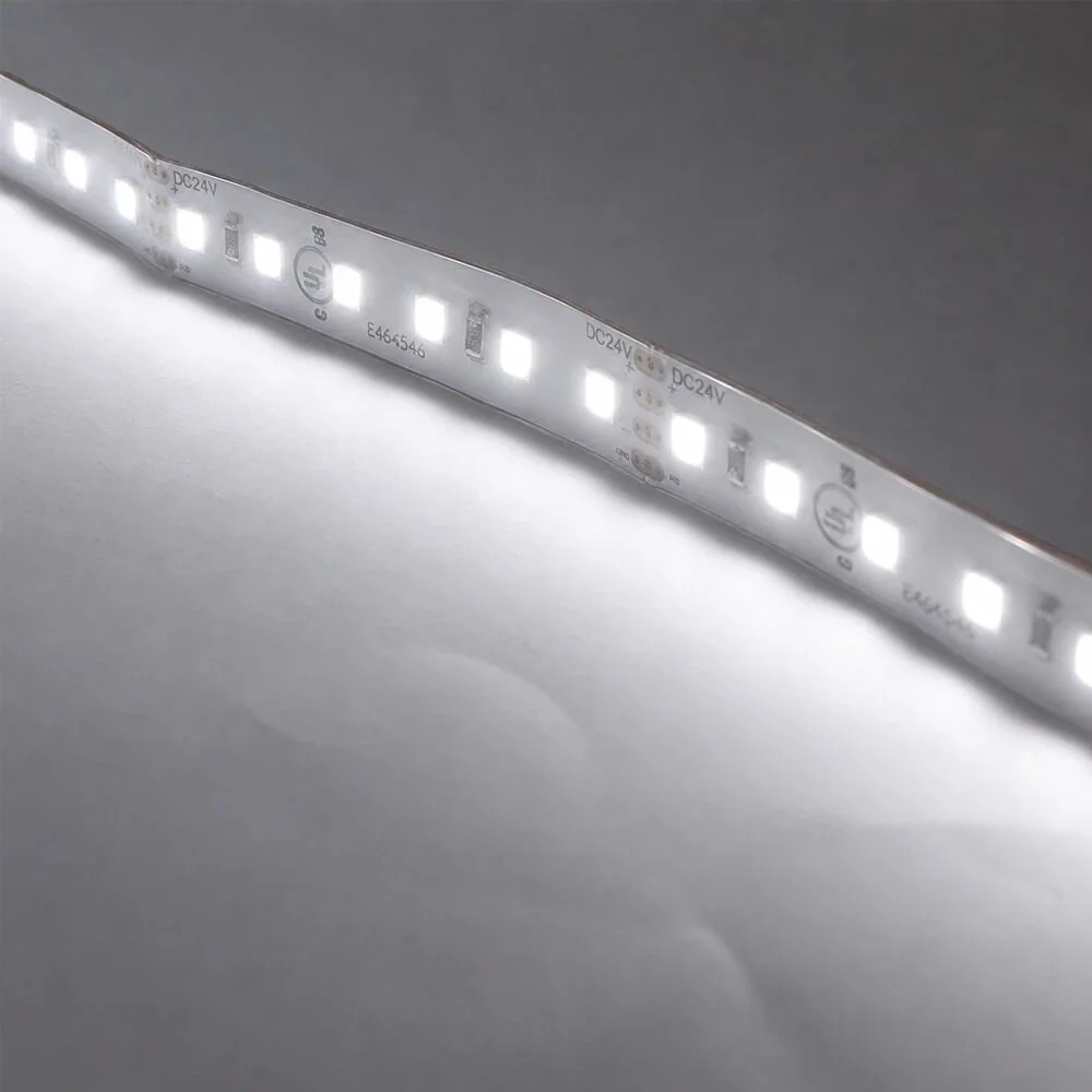 Cool white 24V LED tape washing a surface with even light