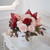 Flowerbox rose et rouge avec palmes et roses, eucalyptus