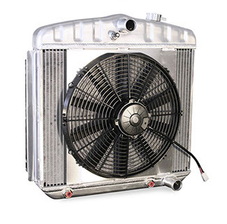 We now offer conversion radiators specifically designed for your Tri-5 with an LS engine. They feature all aluminum construction, but unlike others on the market, they have beautifully stamped tanks with strengthening indentations just like your original. The all important steam port bung is welded into the upper part of the tank which lets your new LS engine vent properly. They also include a coolant temp fan switch in the tank as well as a billet radiator cap. Excellent restoration type quality made in the USA. Available in bare aluminum or black and with or without a 16" high performance electric fan installed. The radiators below are in the V8 configuration that mounts to the back of the core support.