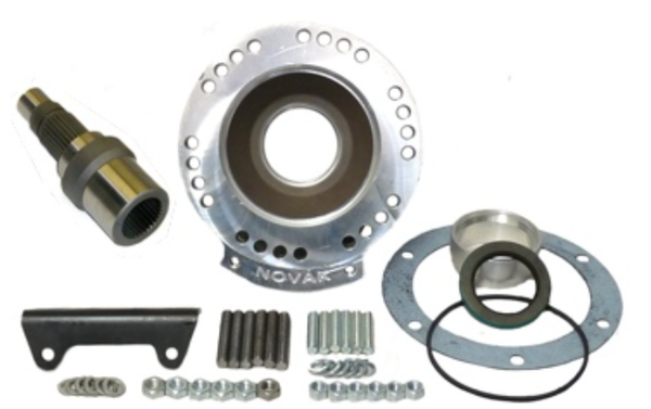 The Novak 6L80 to Jeep transfer cases adapter is compact at only 3-1/4" long for a combined transmission and adapter length of 26-1/2" (equivalent to a ~19-1/2" manual transmission). The adapter itself is machined of a 6061T6 billet aluminum alloy, featuring thick flanges and a heavy cross-section.

Advanced computer modeling methods were integral to the design of our 6L83 adapter assembly. We were able to push the bounds of product and process well beyond the status quo.

Our adapter is drilled for multiple clocking locations from near-factory (20 degrees down) to near-flat (3 degrees down). However, pan clearances and front axle width may inhibit the flatter options.

This transfer case adapter's design is based on Novak's Universal Series adapters that feature a modular mounting and support system. Included with the adapter kit is a steel base that is a highly configurable mounting foot.

Kit Includes: Billet adapter housing, transfer case input, transfer case to adapter gasket, fastening hardware, steel mounting base, and instructions.

There are two versions of the 6L80E transmission output shaft that will work with the Novak adapter. The stock 4WD version will work without modification to the transmission. The stock 2wd truck version will work with several modifications done externally. Other versions require the output shaft of the transmission be replaced and the rear of the unit sealed. All years of the 6L80E are compatible with the kits. 

The 4wd version 6L80E is ready to bolt up to our 6L81 adapter kit. Disassembly of the transmission is unnecessary as the 32 spline 4wd style output shaft which protrudes about 3" from the rear face of the 4L80E transmission main case is correct for this kit version. Disassembly of the transfer case is necessary to install a new matching 32 spline input gear.

The input shaft installation is a 1-2 hour bench job and usually includes either a simple gasket and seal replacement or preferably a full rebuild of a tired D300. Bearings and pre-load are involved with this job. It is not requisite that you rebuild your Dana 300 to successfully complete the conversion. However, it is certainly worth consideration especially if your transfer case leaks or has many years of service. 

The input gear installation is a 2-3 hour bench job and usually includes either a simple gasket and seal replacement or preferably a full rebuild of a tired transfer case, especially a chain replacement. It is not requisite that you rebuild your transfer case to successfully complete the conversion. However, it is certainly worth consideration especially if your transfer case leaks or has many years of service. You will be going all the way into the front of the transfer case to install in the input gear. 

 

