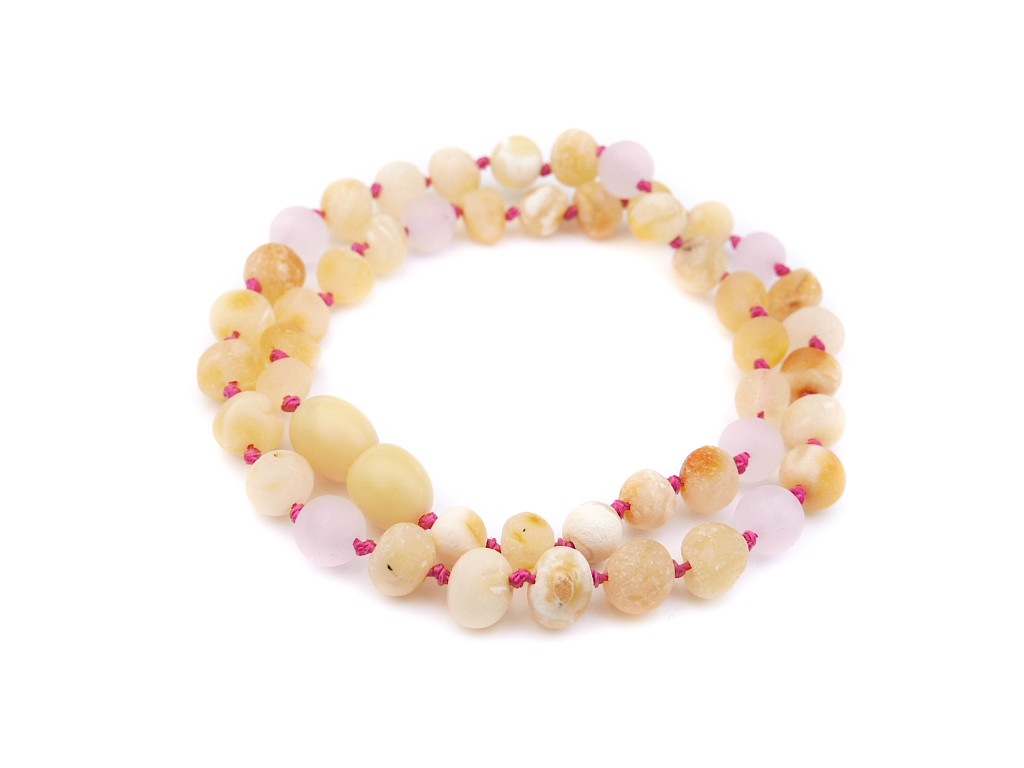 Organic-style children’s Baltic amber teething necklace with unpolished butterscotch beads and quartz