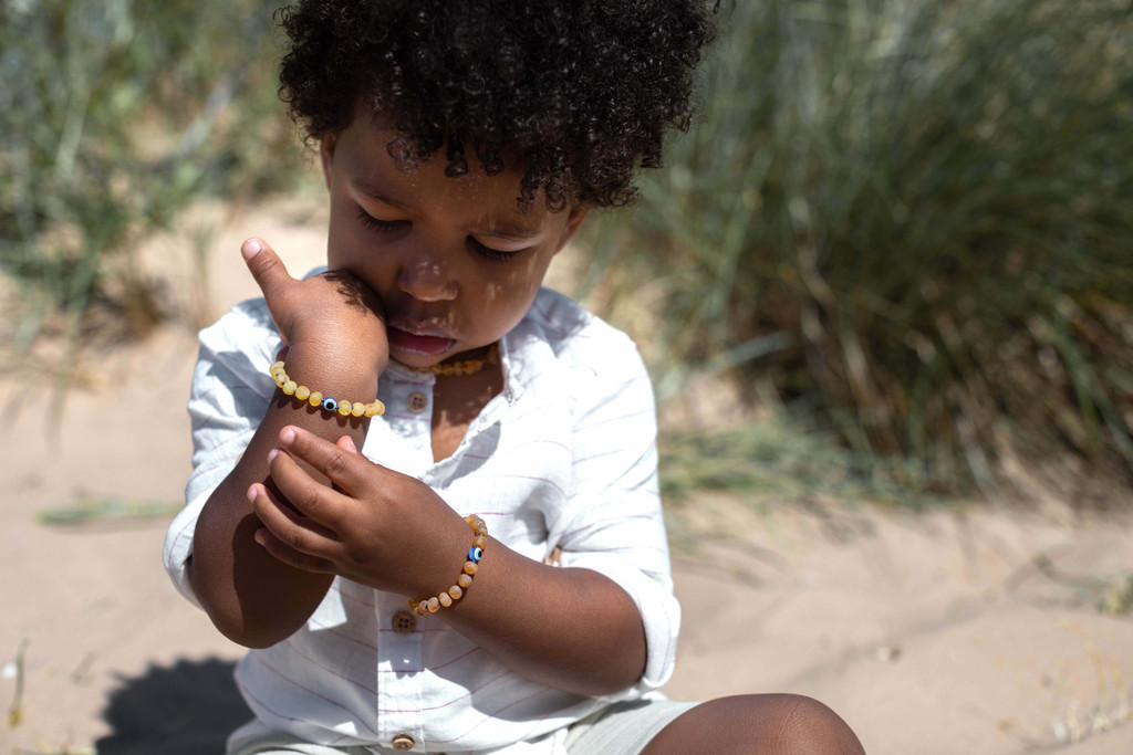 Evil Eye raw unworked Baltic amber teething bracelet – handcrafted genuine amber jewellery for children