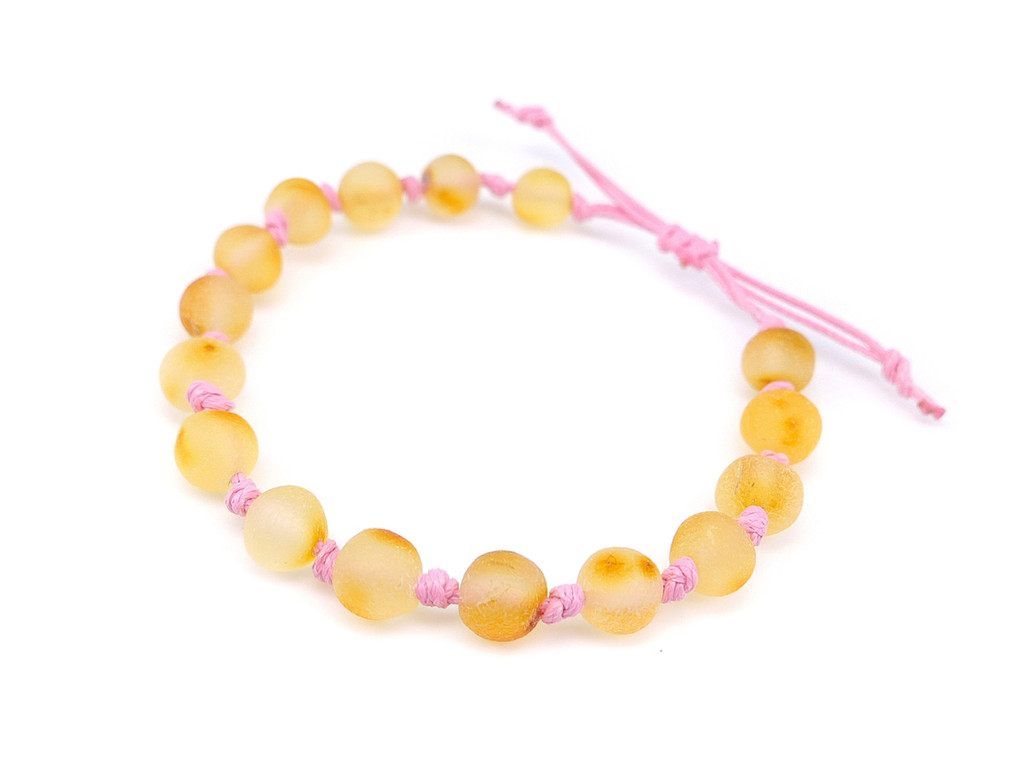 Pink adjustable amber teething bracelet