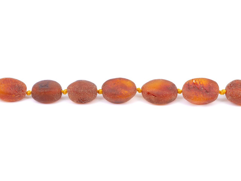 Natural unpolished cognac amber teething necklace with knotted olive beads for babies