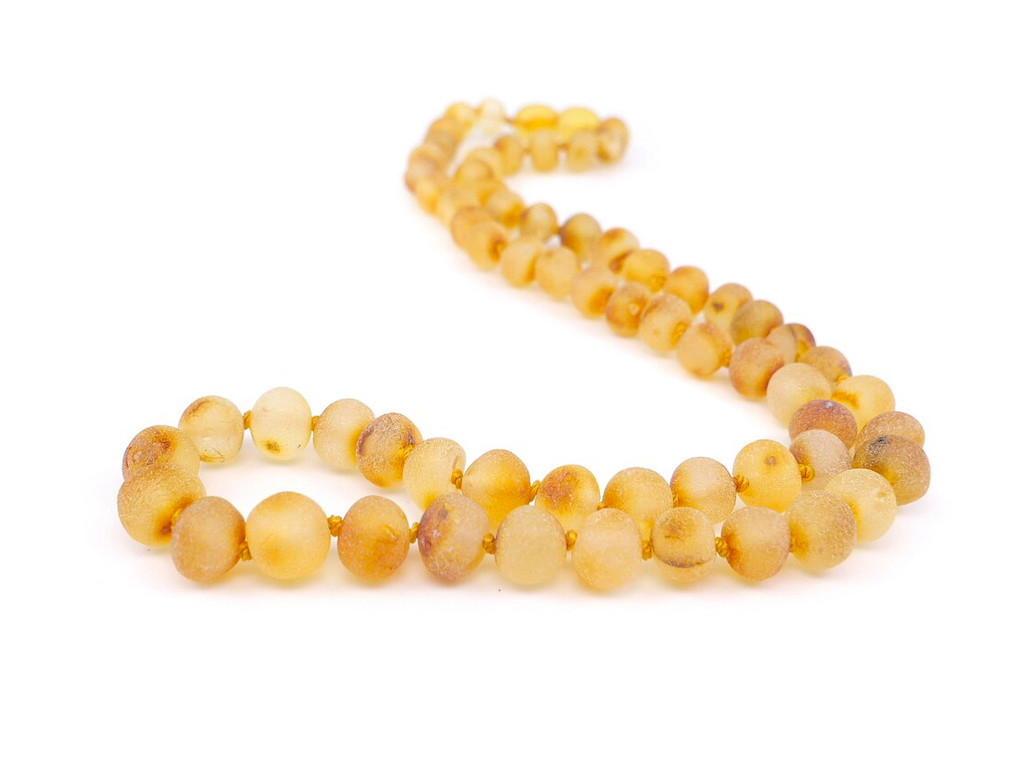 Amber necklace for adults with raw honey beads offering natural comfort and a soothing wearing experience