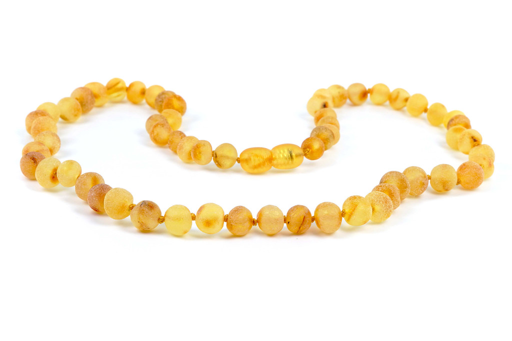 Adult amber necklace with raw honey beads offering natural comfort for head, neck and throat areas