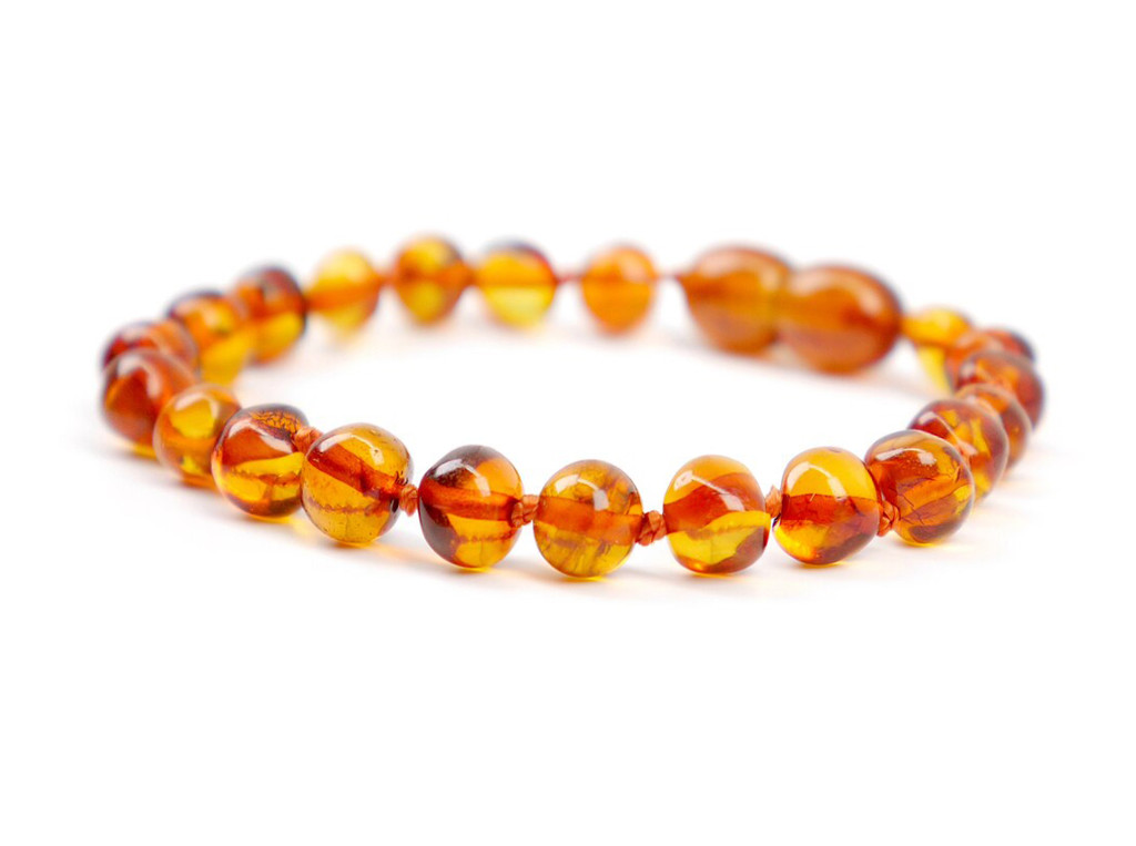 Baby cognac Baltic amber teething bracelet / anklet featuring smooth polished baroque beads and durable hand-knotted design
