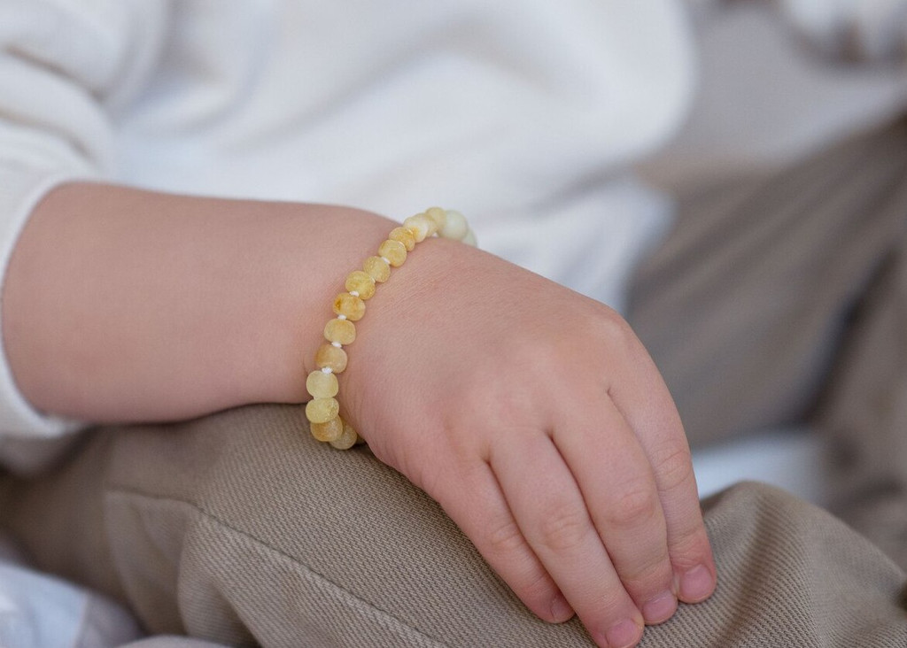 Butterscotch milky amber teething bracelet. Baby teething treatment UK