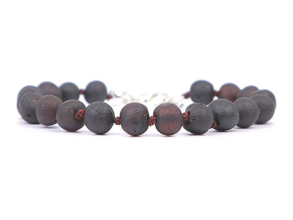 Raw unpolished Baltic amber teething beads for children with adjustable design