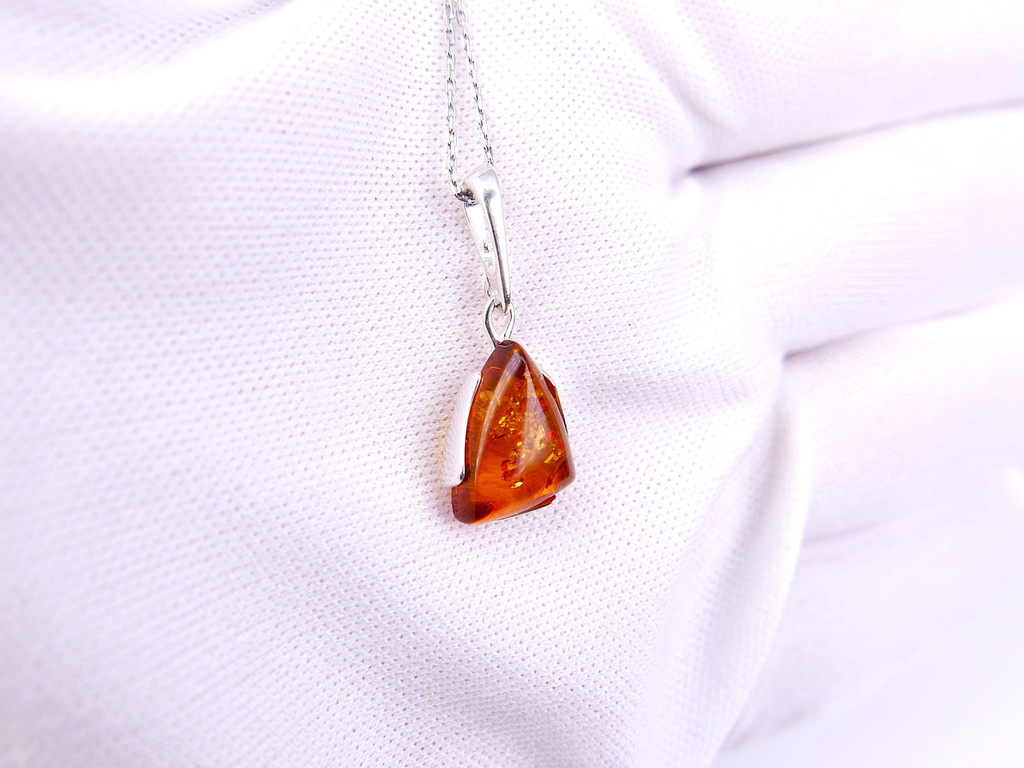 Baltic amber silver triangular pendant