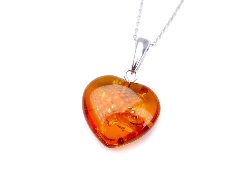 Natural Baltic amber heart pendant in hallmarked 925 sterling silver with warm cognac amber stone