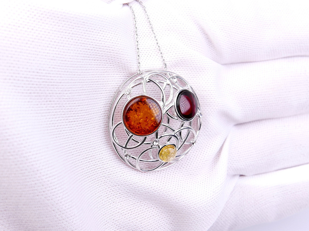 Baltic amber round open circle pendant in sterling silver