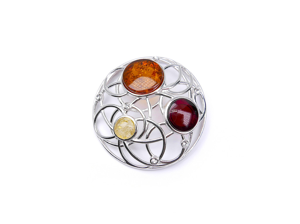 Round openwork Baltic amber pendant crafted from hallmarked 925 sterling silver, featuring polished natural amber stones with distinctive internal patterns