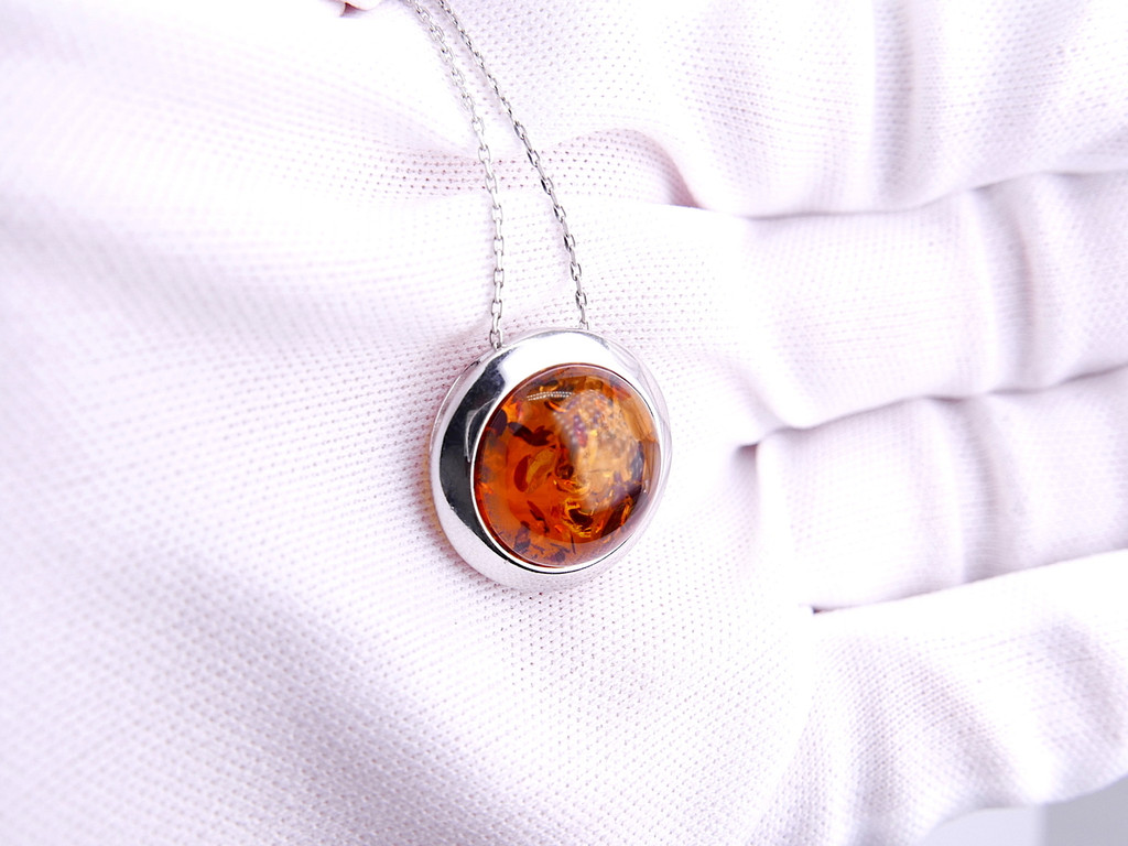 Baltic amber round moon shape silver pendant